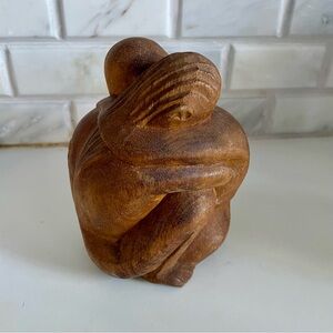 Lovers embrace wooden figurine